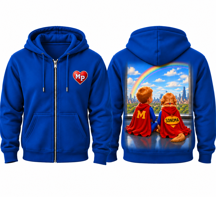 Front and back of a royal-blue zip hoodie with an MP heart on the chest and Mack and Sonoma in superhero capes looking toward the Chicago skyline beneath a rainbow